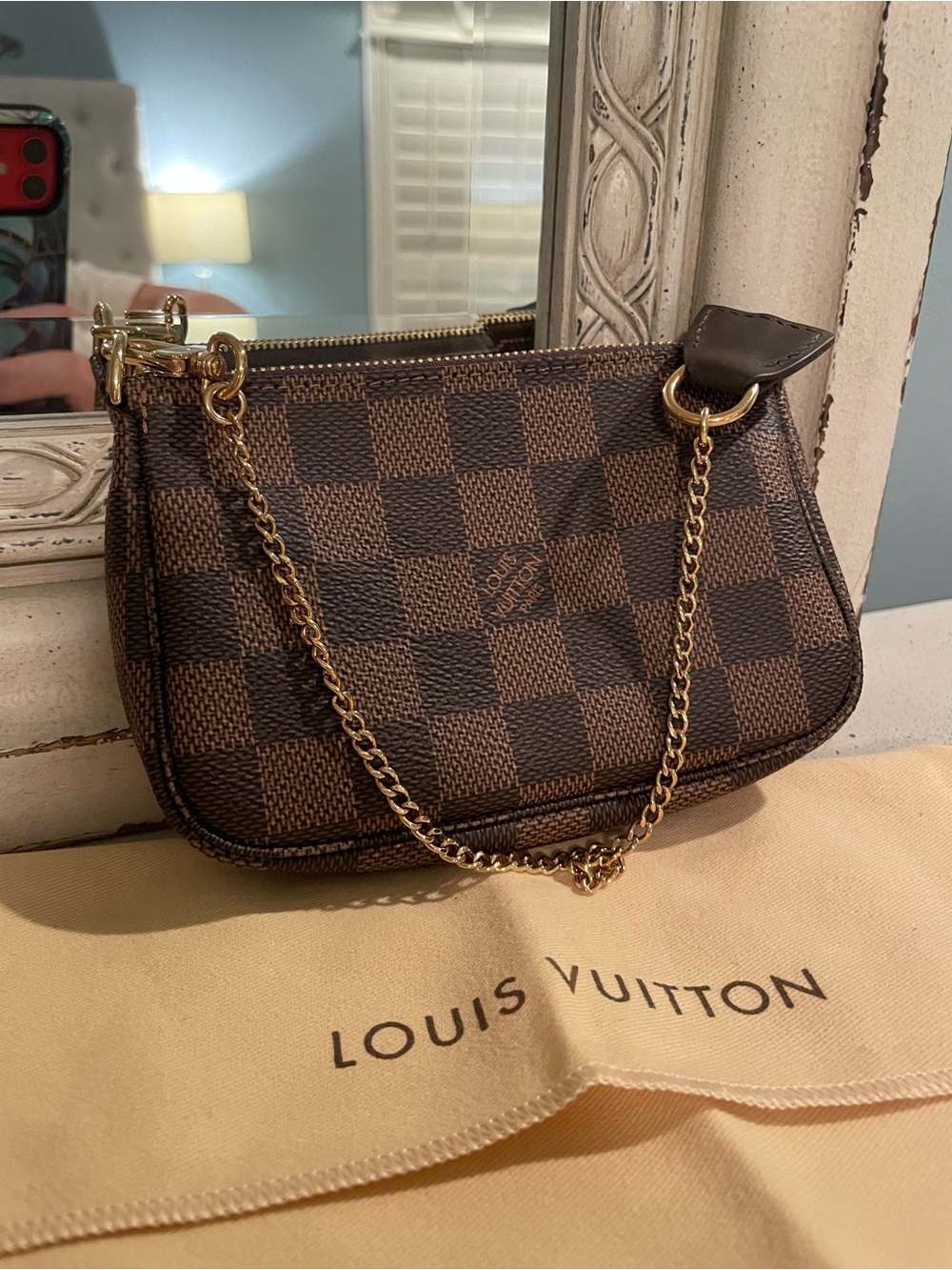 Authentic Louis Vuitton mini pochette Damier Ebene